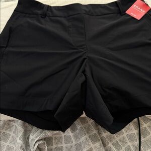 COPY - Brand new pair of Spanx shorts that are black with pockets.